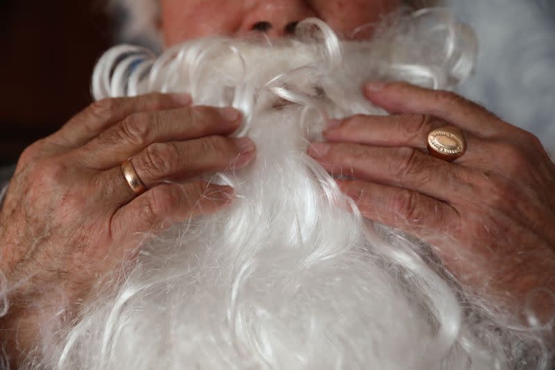 The Wider Image: Christmas wishes from Santas around the world