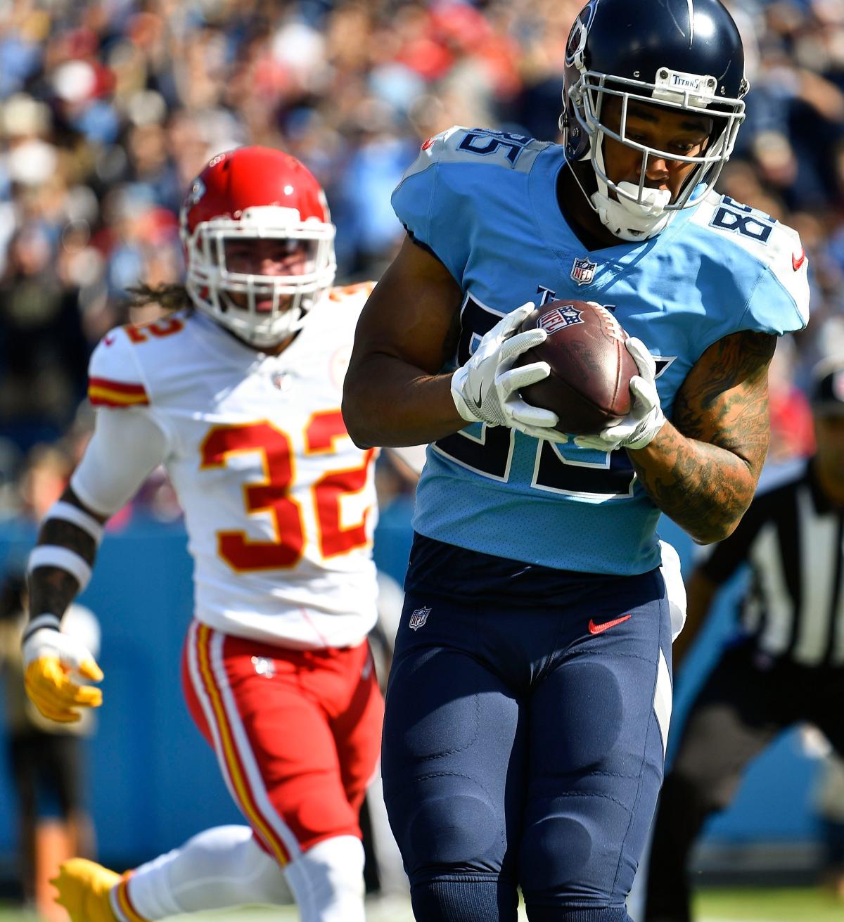 MyCole Pruitt of the Tennessee Titans runs on the field during the