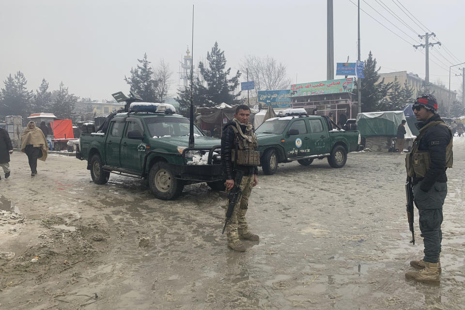 Afghan police arrive at the site of an explosion near the military academy in Kabul, Afghanistan, Tuesday, Feb. 11, 2020. An explosion occurred early Tuesday near the military academy in a southern neighborhood of the Afghan capital, a government spokesman said. (AP Photo/Rahmat Gul)