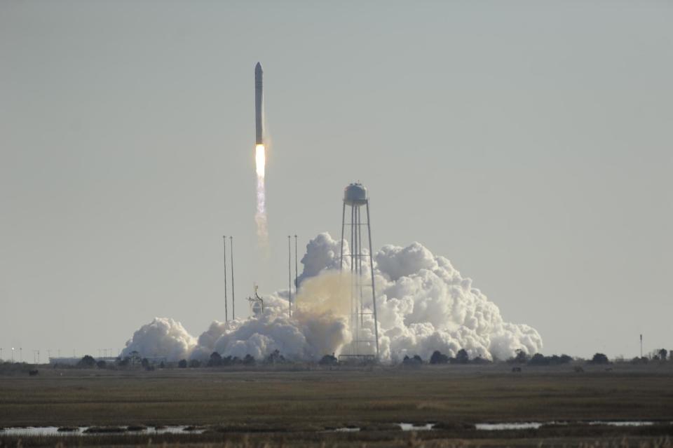 Orbital Science Corps.' Antares rocket lifts off from Wallops Island, Va. on Thursday, Jan. 9, 2014. The rocket is carrying the company's first official re-supply mission to the International Space Station. (AP Photo/Eastern Shore News, Jay Diem)