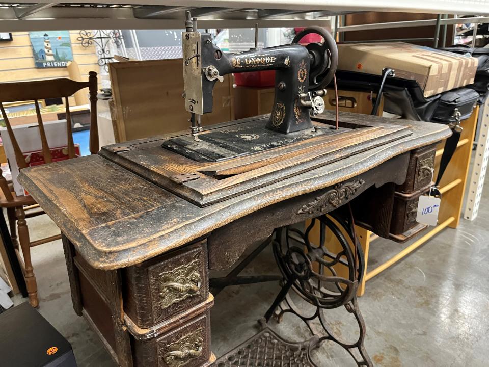 This antique sewing machine is among the items for sale at The Thrift Store.