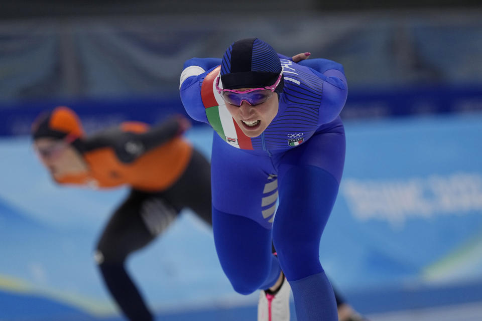 Francesca Lollobrigida of Italy competes against Irene Schouten of the Netherlands during the women's speedskating 3,000-meter race at the 2022 Winter Olympics, Saturday, Feb. 5, 2022, in Beijing. (AP Photo/Sue Ogrocki)