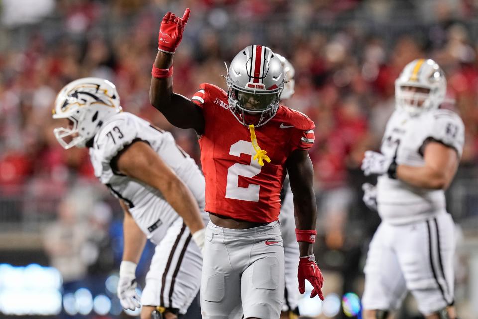 Sep 7, 2024; Columbus, Ohio, USA; Ohio State Buckeyes safety Caleb Downs (2) celebrates a tackle during the first half of the NCAA football game against the Western Michigan Broncos at Ohio Stadium.