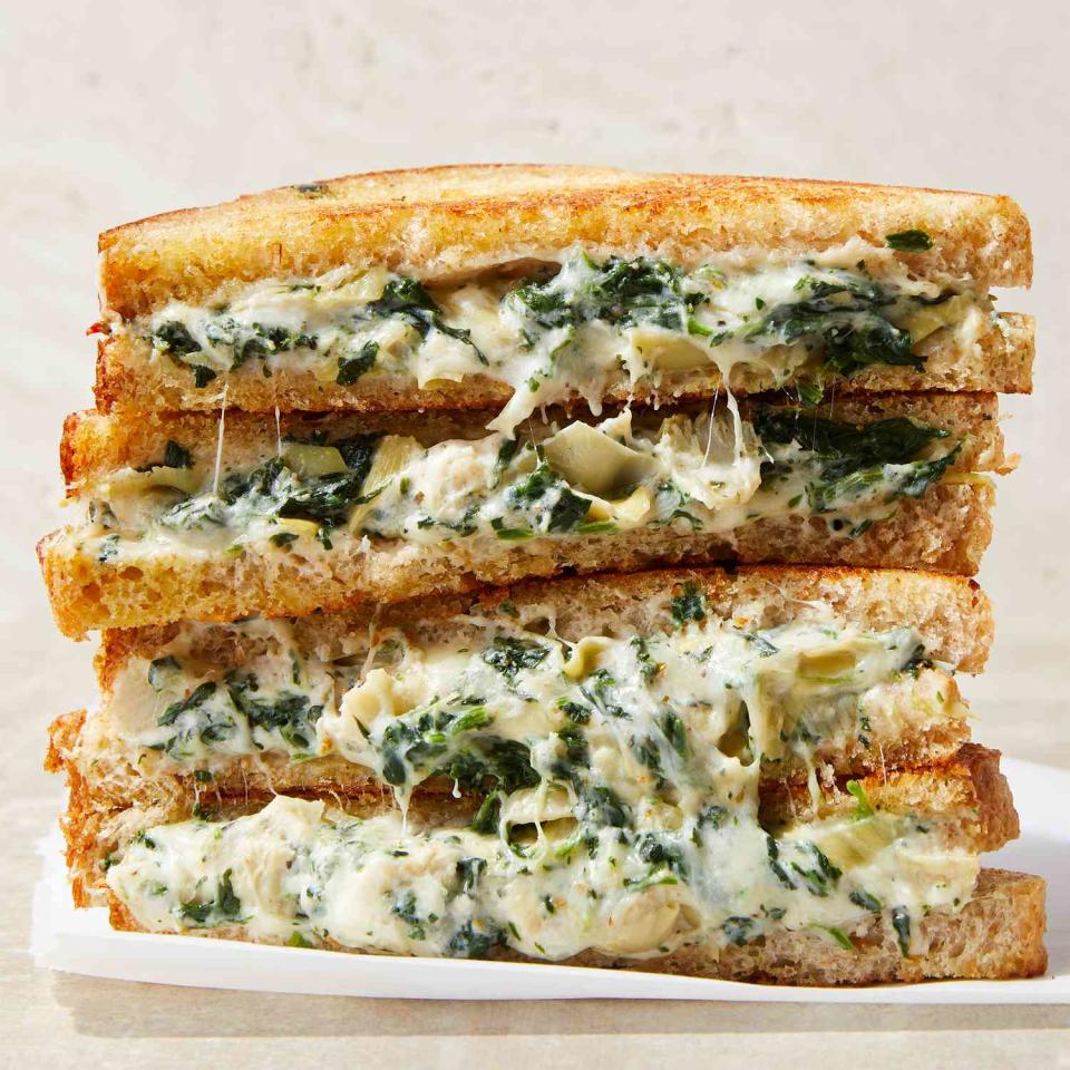 <p>This spinach-and-artichoke-dip grilled cheese offers the classic ooey-gooey filling, packed with plenty of spinach and artichokes, between two slices of crispy toasted bread so you can ditch the dipping. <a href="https://www.eatingwell.com/recipe/7964556/spinach-artichoke-dip-grilled-cheese/" rel="nofollow noopener" target="_blank" data-ylk="slk:View Recipe;elm:context_link;itc:0;sec:content-canvas" class="link ">View Recipe</a></p>