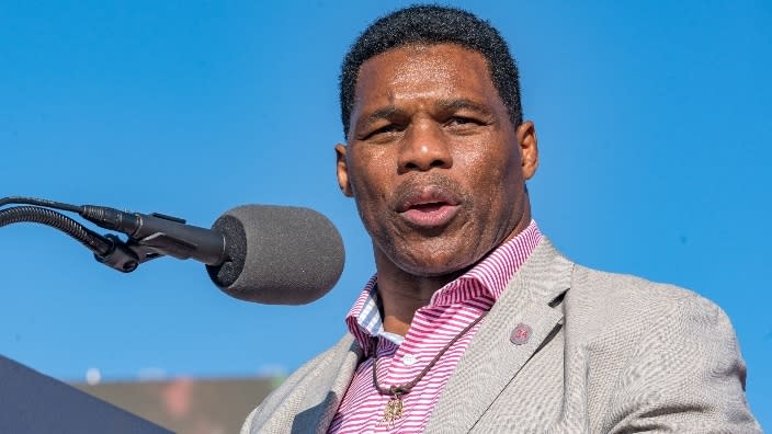Former Heisman Trophy winner and candidate for U.S. Senate Herschel Walker speaks to supporters of former U.S. President Donald Trump during a March rally at the Banks County Dragway in Commerce, Georgia. (Photo: Megan Varner/Getty Images)