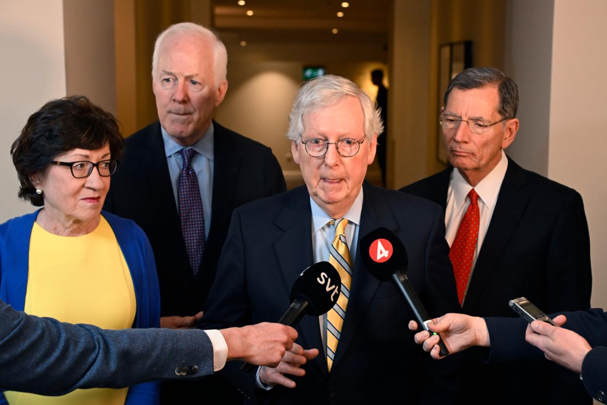 U.S. Republican Sens. Mitch McConnell, center, and from left, Susan Collins, John Cornyn and John Barrasso speak with Swedish media at the Grand Hotel in Stockholm after a meeting with Swedish Prime Minister Magdalena Andersson and Minister of Defense Peter Hultqvist on Sunday, May 15, 2022. 