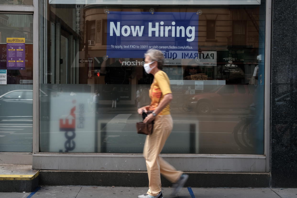NEW YORK, NEW YORK - AUGUST 19: A hiring sign is displayed in a store window in Manhattan on August 19, 2021 in New York City. Despite continued concerns about the Delta variant of the Covid virus, the United States economy continues to grow with the  leading economic index jumping 0.9% last month. (Photo by Spencer Platt/Getty Images)