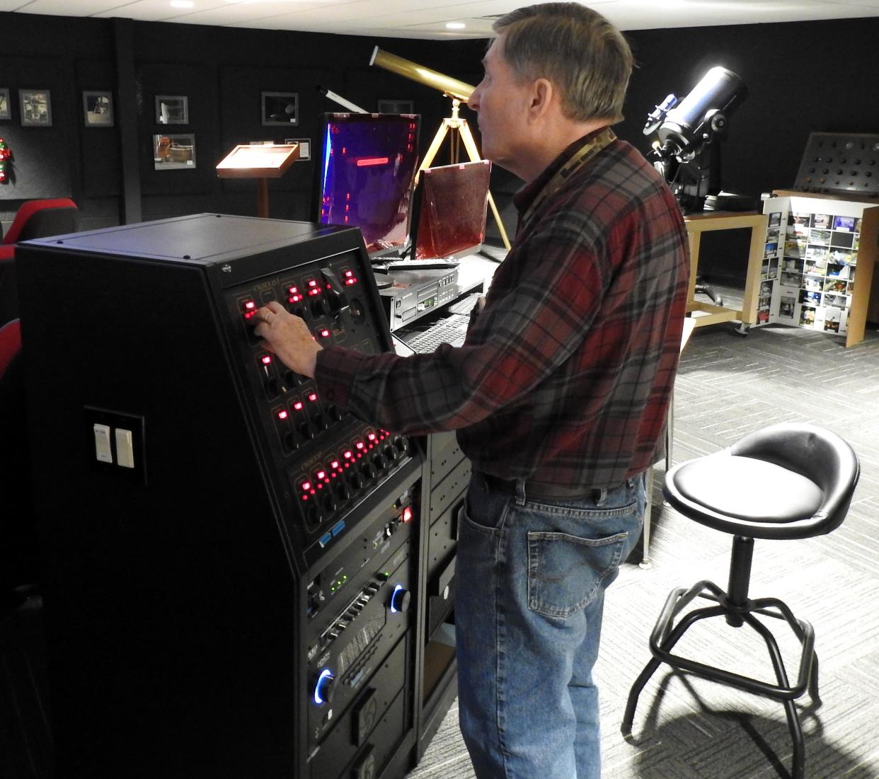 Ron Derewecki adjusts controls of equipment at the Coshocton Planetarium. Derewicki spearheaded a campaign in 2013 to move the planetarium from the former Central Elementary School when it was demolished. Along with classes for students, the planetarium is also used for public shows to give back to a community who donated more than $420,000 to save the planetarium.