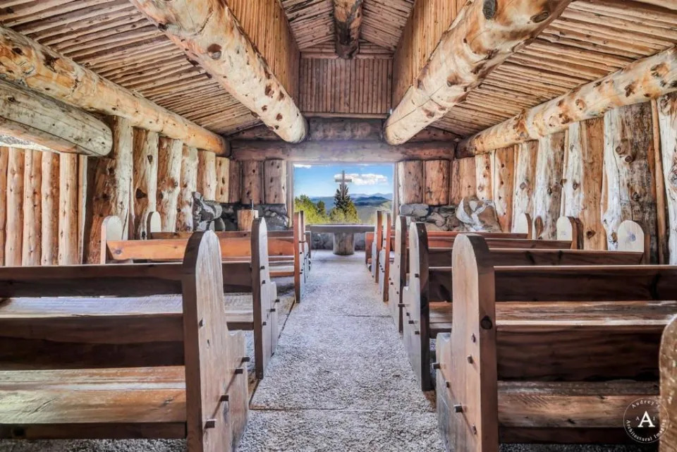 The chapel, with wood-heavy details, also has a choir loft. Audrey Todd Davis