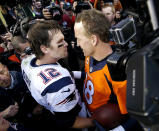 FILE - In this Sunday, Jan. 24, 2016 file photo, New England Patriots quarterback Tom Brady (12) and Denver Broncos quarterback Peyton Manning speak to one another following the NFL football AFC Championship game between the Denver Broncos and the New England Patriots in Denver. Tom Brady has been synonymous with the AFC championship for the last two decades. Thirteen times he played for the Lamar Hunt Trophy and nine times he won it. Peyton Manning he bested once but three other times he lost to his nemesis in the conference title game, twice in Denver.(AP Photo/David Zalubowski, File)