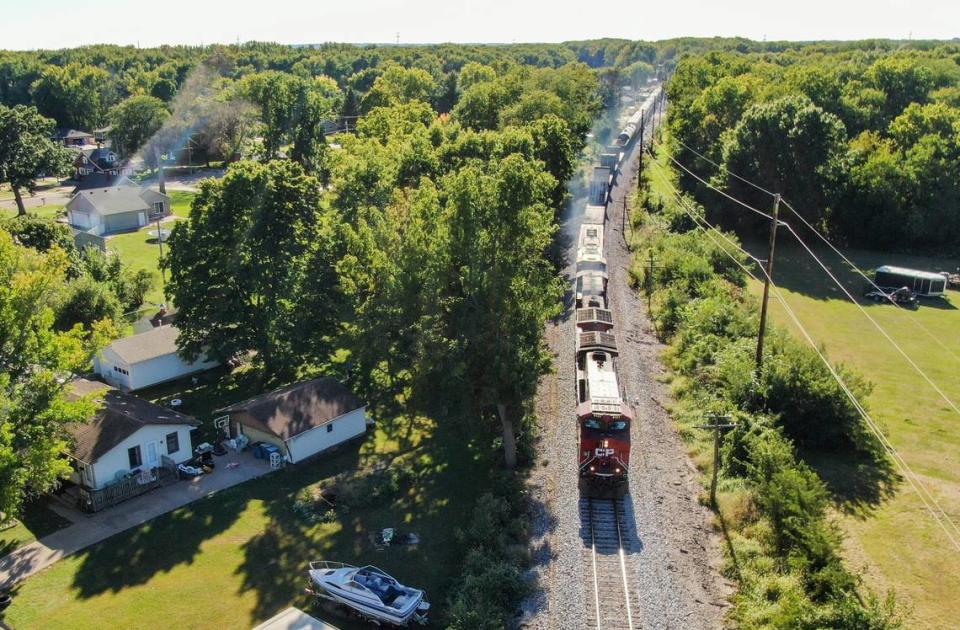 Residents of Camanche, Iowa, fear a merger of Kansas City Southern and Canadian Pacific will lead to more blocked crossings and keep first responders from reaching some residents.