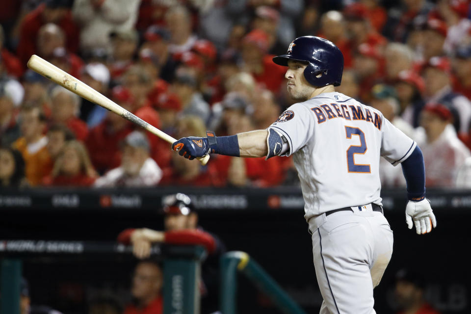 Houston Astros' Alex Bregman watches his grand slam against the Washington Nationals during the seventh inning of Game 4 of the baseball World Series Saturday, Oct. 26, 2019, in Washington. (AP Photo/Patrick Semansky)