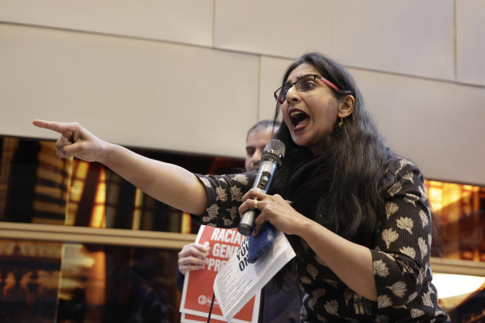 Seattle Council Member Kshama Sawant speaks to supporters and opponents of a proposed ordinance to add caste to Seattle's anti-discrimination laws at a rally at Seattle City Hall, Tuesday, Feb. 21, 2023, in Seattle. Sawant proposed the ordinance. (AP Photo/John Froschauer)