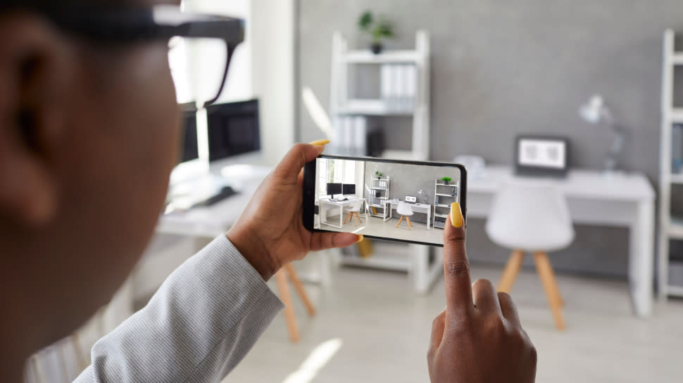  man filming video on a smartphone 