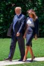 The presidential couple departed the White House en route to Joint Base Andrews on 18 July. For the engagement, Melania opted for a navy-hued skirt suit. [Photo: Getty]