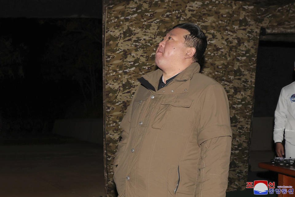 In this photo provided by the North Korean government, North Korean leader Kim Jong Un watches a rocket launch from a launching center in North Korea, Tuesday, Nor. 21, 2023. The North’s space agency said that its new “Chollima-1” carrier rocket accurately placed the Malligyong-1 satellite into orbit on Tuesday night. Independent journalists were not given access to cover the event depicted in this image distributed by the North Korean government. The content of this image is as provided and cannot be independently verified. Korean language watermark on image as provided by source reads: "KCNA" which is the abbreviation for Korean Central News Agency. (Korean Central News Agency/Korea News Service via AP)