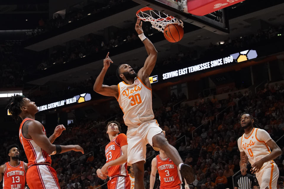 Tennessee guard Josiah-Jordan James (30) dunks the ball during the first half of an NCAA college basketball game against Illinois, Saturday, Dec. 9, 2023 in Knoxville, Tenn. (AP Photo/George Walker IV)