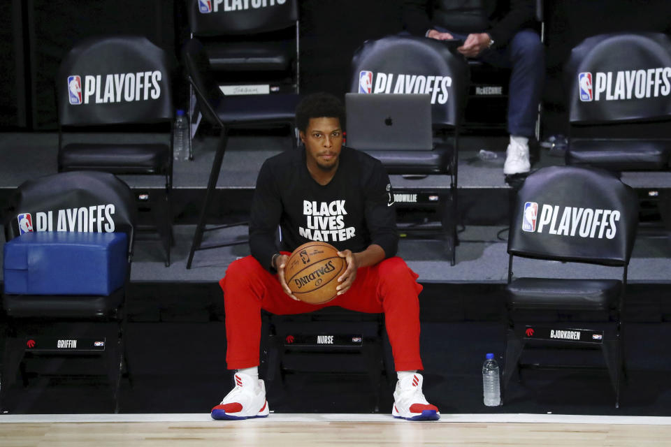 Toronto Raptors guard Kyle Lowry (7) looks on before Game 3 of an NBA basketball first-round playoff series against the Brooklyn Nets, Friday, Aug. 21, 2020, in Lake Buena Vista, Fla. (Kim Klement/Pool Photo via AP)