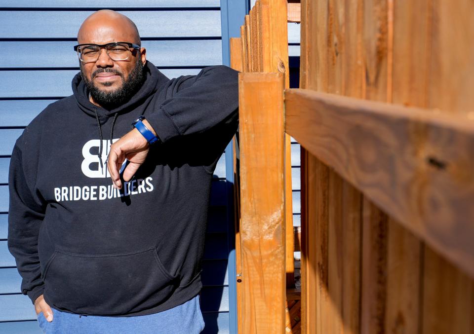 William Olivier carried a gun illegally as a teen in Milwaukee and now he is a gun instructor. He works as community impact pastor for Bridge Builders, a neighborhood improvement organization.