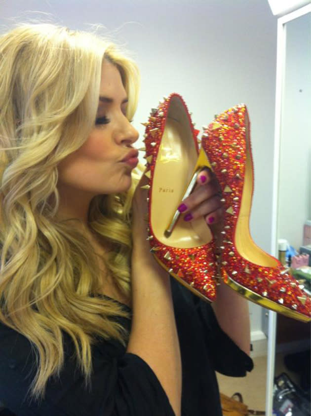 Celebrity photos: Holly Willoughby gave us serious shoe envy when she tweeted this snap of her holding  a pair of divine heels given to her by will.i.am. She said: “OMG thank you Santa Louboutin... Aka @iamwill... I just love them!” We’re seriously jel. Copyright [Holly Willoughby]