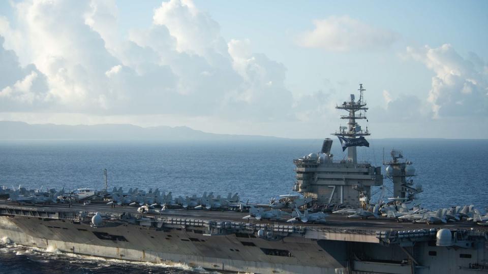 The aircraft carrier Theodore Roosevelt steaming off Guam in June 2020. (Navy)