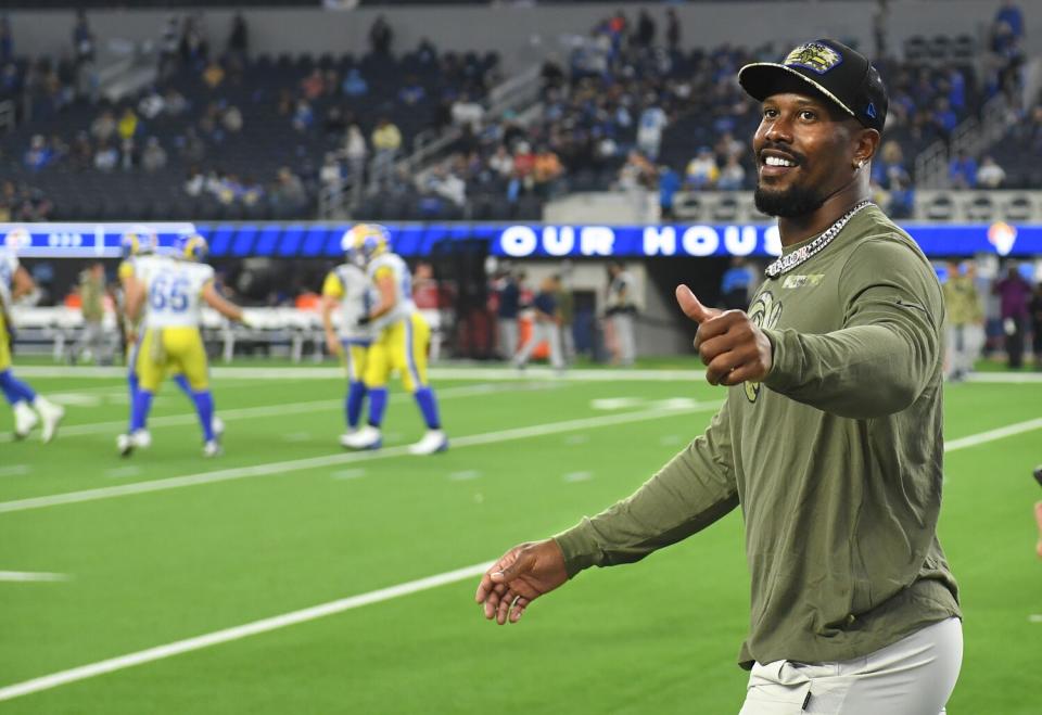 Rams linebacker Von Miller greets fans with a thumbs up before a game against the Titans at SoFi Stadium