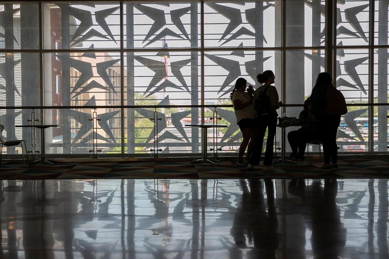 Students socialize at Austin Community College's Highland Campus last year. ACC plans to launch a Bachelor of Applied Science in cybersecurity this fall — its fourth bachelor's degree program.