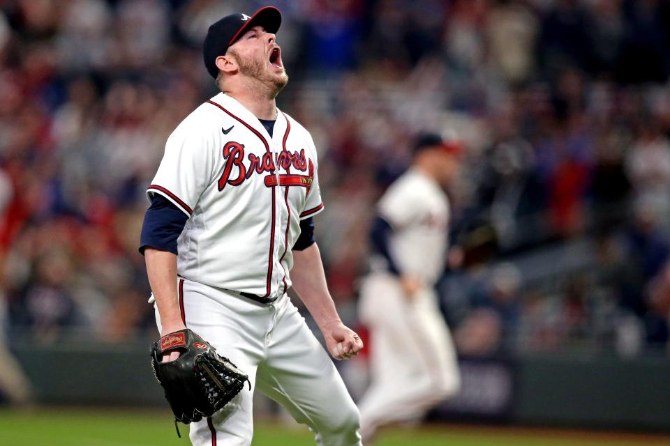 Atlanta Braves reliever Tyler Matzek (68) reacts after striking out three batters with runners in scoring position in the seventh inning of the NLCS.
