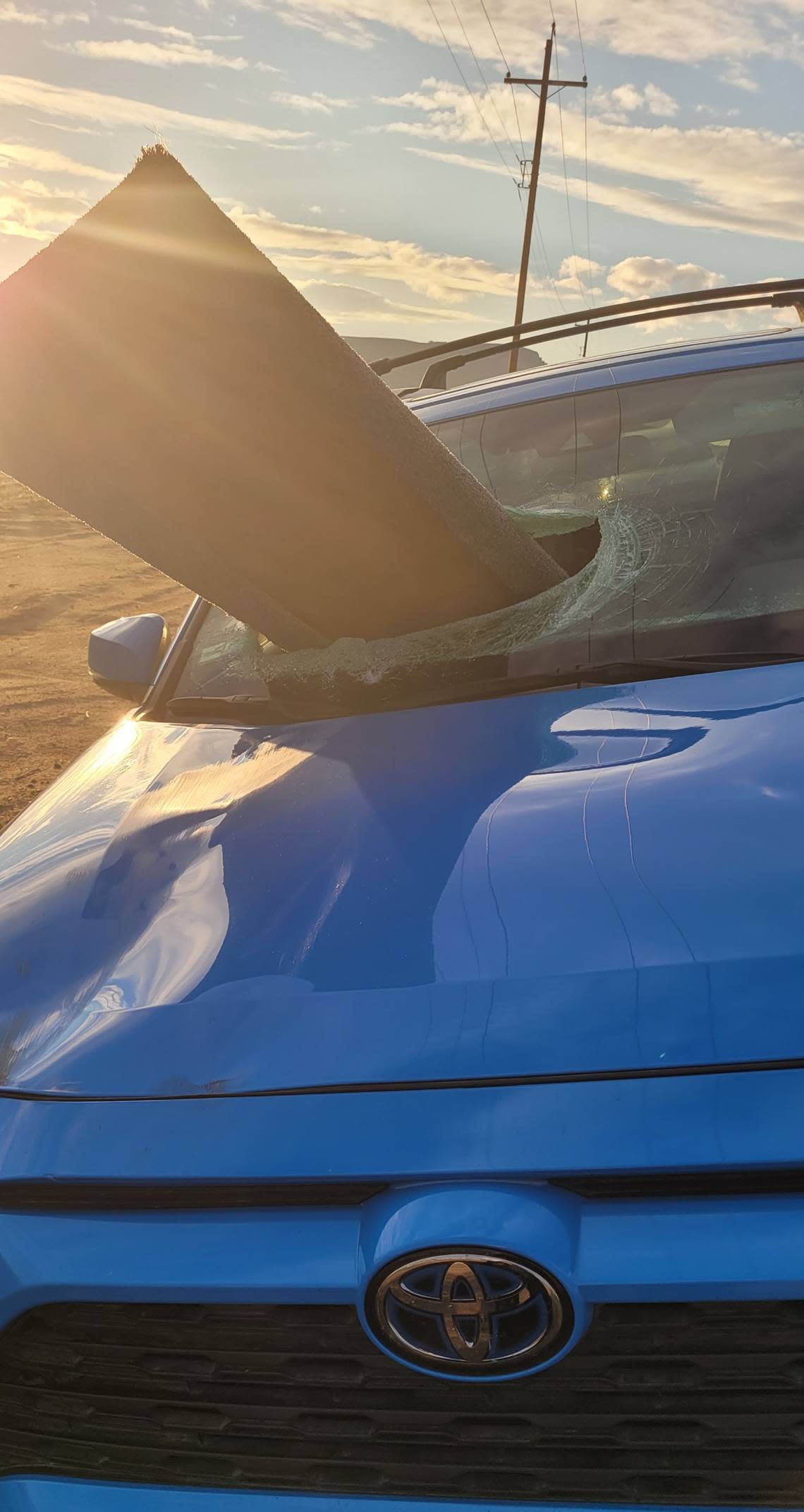 Crystal Christman shared photos of damage to her SUV cause by a piece of debris that flew out of the back of a truck while she was driving on Highway 145 near Madera.