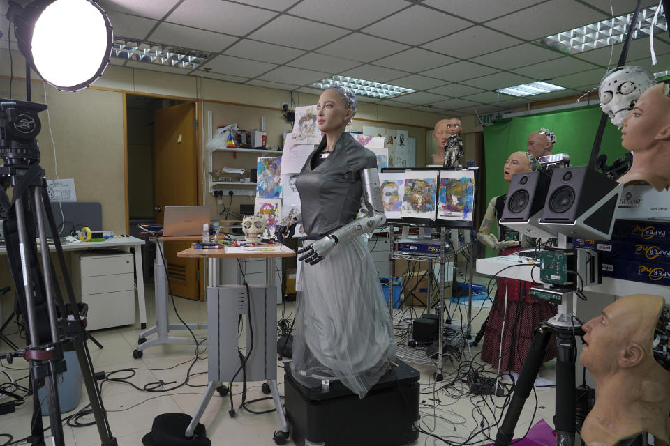 Sophia receives interview at Hanson Robotics studio in Hong Kong on March 29, 2021. Sophia is a robot of many talents — she speaks, jokes, sings and even makes art. In March, she caused a stir in the art world when a digital work she created as part of a collaboration was sold at an auction for $688,888 in the form of a non-fungible token (NFT). (AP Photo/Vincent Yu)