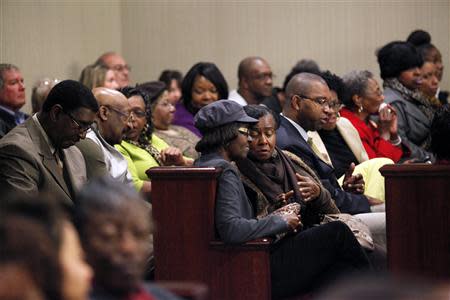A large crowd fills the courtroom at the hearing to reopen the case for George Stinney Jr. in Sumter, South Carolina January 21, 2014. REUTERS/Randall Hill