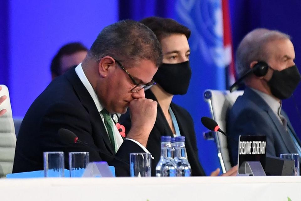 Britain's President for Cop26 Alok Sharma reacts as he makes his concluding remarks after a tense discussions over fossil fuel language in Glasgow in 2021 (AFP via Getty Images)