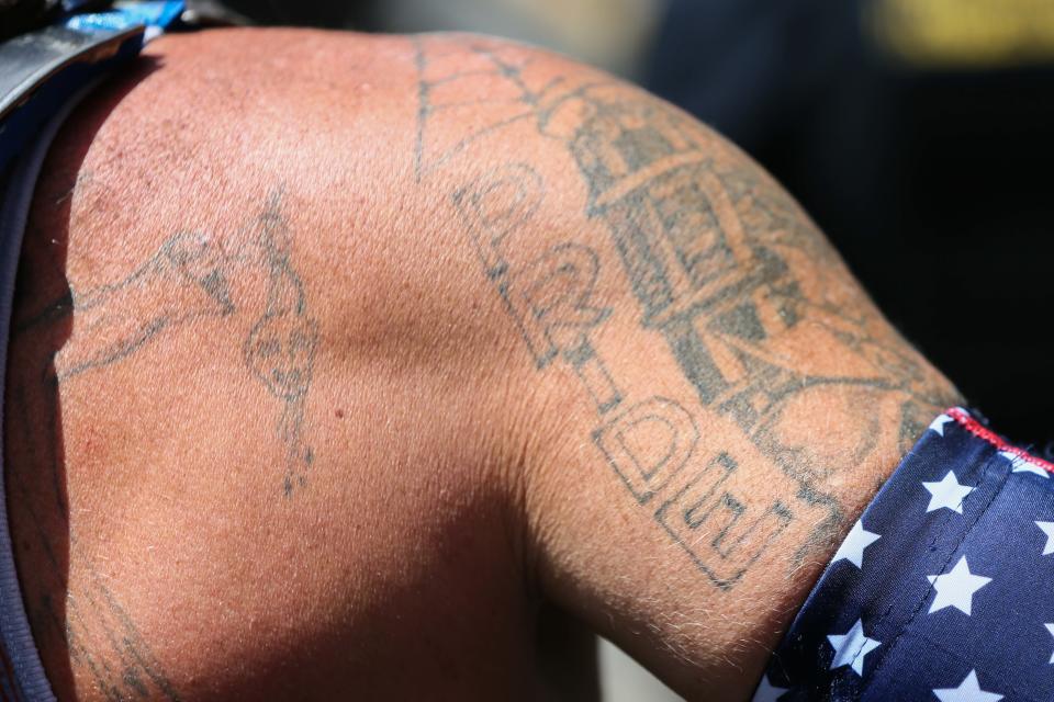 "Based Spartan's" tattoos.&nbsp;