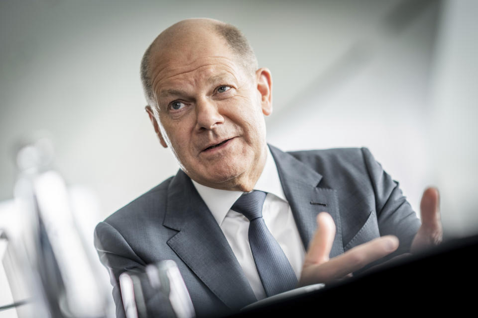 German Chancellor Olaf Scholz speaks during an interview in his office at the Chancellery, in Berlin, Germany, Friday June 17, 2022. (Michael Kappeler/dpa via AP)