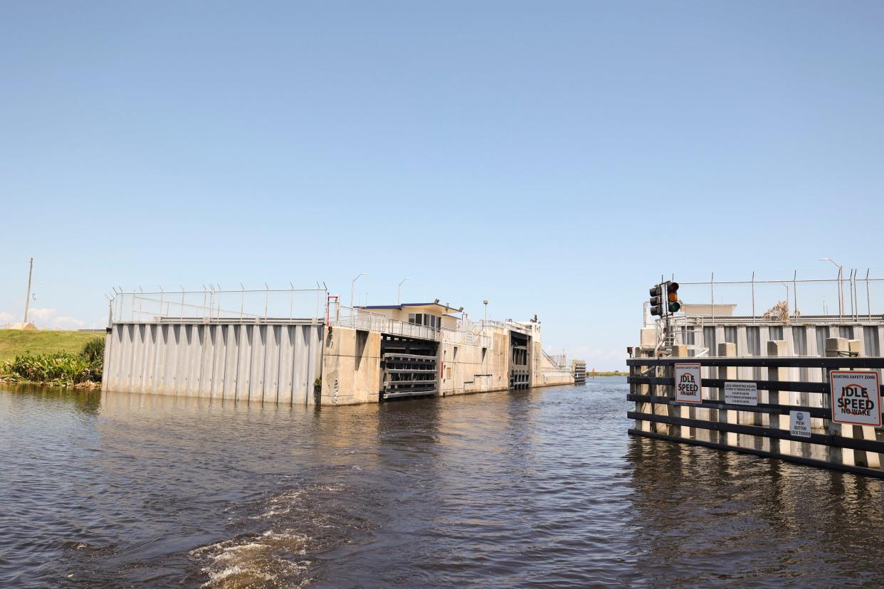 The Herbert Hoover Dike surrounds 143 miles of Lake Okeechobee and measures 34 feet tall and 200 feet wide at its base.