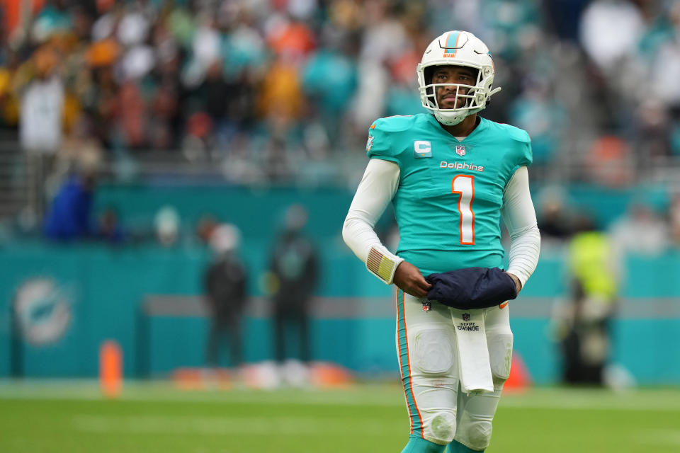 Dec 25, 2022; Miami Gardens, Florida, USA; Miami Dolphins quarterback Tua Tagovailoa (1) stands on the field during the second half against the Green Bay Packers at Hard Rock Stadium. Mandatory Credit: Jasen Vinlove-USA TODAY Sports