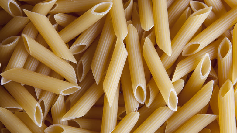 dried penne in a pile