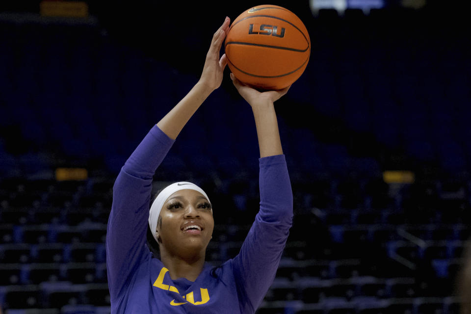 LSU forward Angel Reese warms up before an NCAA college basketball exhibition game against East Texas Baptist, Thursday, Oct. 26, 2023, in Baton Rouge, La. (AP Photo/Matthew Hinton)
