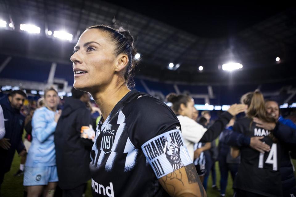 Gotham FC's Ali Krieger wears a captain's armband that reads "Thank You Ali" during her final home game before retiring.