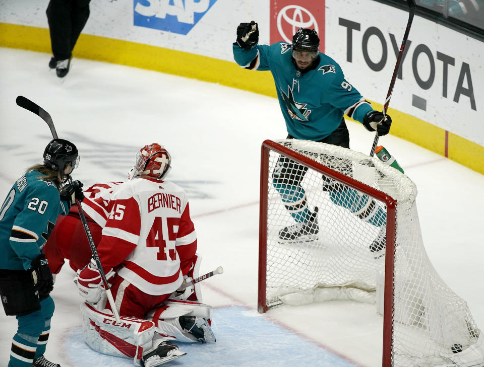 San Jose Sharks left wing Evander Kane (9) celebrates after scoring a goal past Detroit Red Wings goaltender Jonathan Bernier (45) during the third period of an NHL hockey game Monday, March 25, 2019, in San Jose, Calif. The Detroit Red Wings won 3-2. (AP Photo/Tony Avelar)