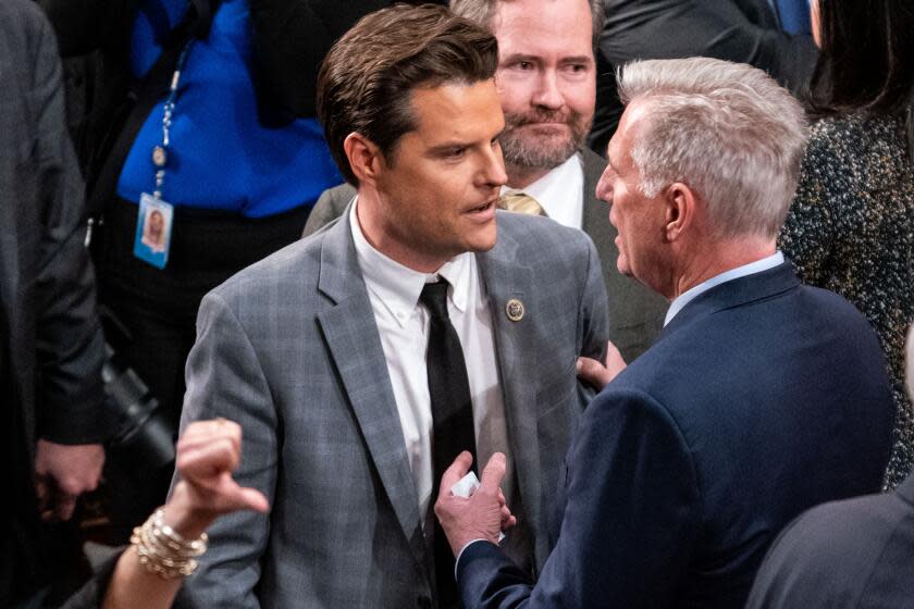 WASHINGTON, DC - JANUARY 06: Rep. Matt Gaetz (R-FL) talks with Rep. Kevin McCarthy (R-CA) as the House of Representatives returns to vote for the Speaker of the House in the House Chamber of the U.S. Capitol Building on Friday, Jan. 6, 2023 in Washington, DC. After multiple failed attempts to successfully elect a Speaker of the House - the first time in 100 years that the Speaker was not elected on the first ballot- the members of the 118th Congress are expected to try again on the second anniversary of the January 6 insurrection. (Kent Nishimura / Los Angeles Times)