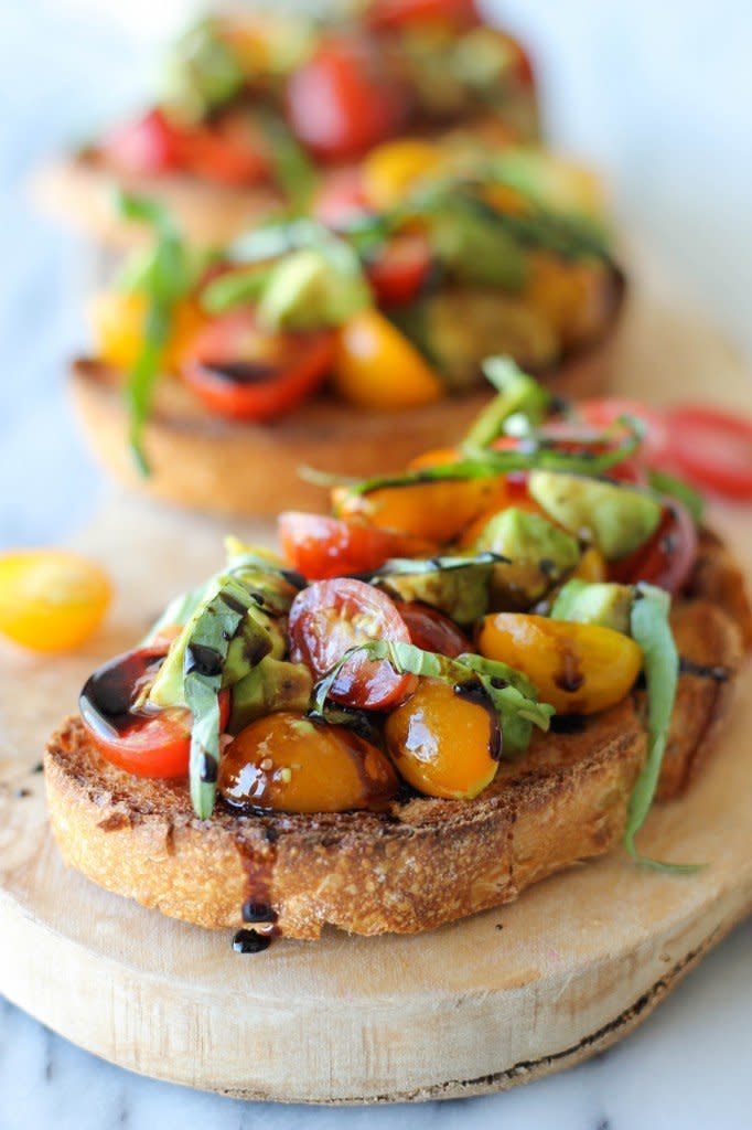 <strong>Get the <a href="http://damndelicious.net/2013/09/11/avocado-bruschetta-balsamic-reduction/" target="_blank">Avocado Bruschetta with Balsamic Reduction recipe</a> from Damn Delicious</strong>