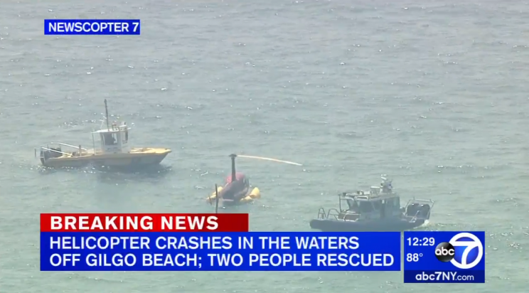 A helicopter carrying Shane McMahon bobs in waters off Long Island. (via screenshot)