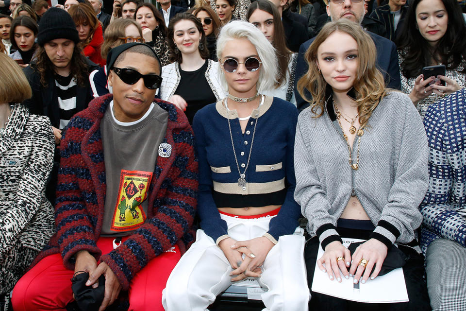 Pharrell Williams, Cara Delevingne and Lily-Rose Depp in the front row at the Chanel show as part of the Paris Fashion Week Womenswear Fall/Winter 2017/2018 on March 7, 2017 in Paris, France. (Photo: Getty Images)