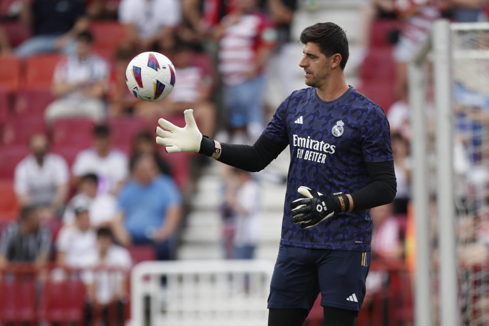 Real Madrid's goalkeeper Thibaut Courtois warms up prior to a Spanish La Liga soccer match between Granada FC and Real Madrid at Los Carmanes stadium in Granada, Spain, Saturday, May 11, 2024. (AP Photo/Fermin Rodriguez)