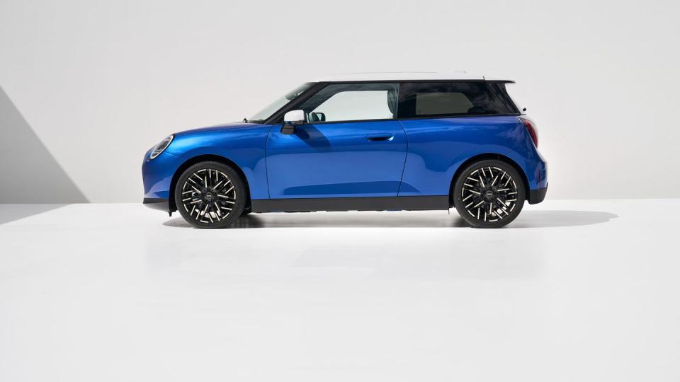 2025 mini cooper electric lineup in ocean blue with white interior