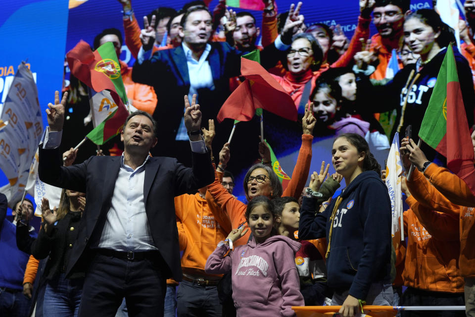 Luis Montenegro, leader of the center-right Democratic Alliance coalition, reacts to his supporters during the election campaign closing rally in Lisbon, Friday, March 8, 2024. Portugal is holding an early general election on Sunday when 10.8 million registered voters elect 230 lawmakers to the National Assembly, the country's Parliament. (AP Photo/Armando Franca)