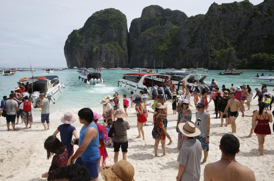 Tourists enjoy the beach on Maya Bay, Phi Phi Leh island (AP)