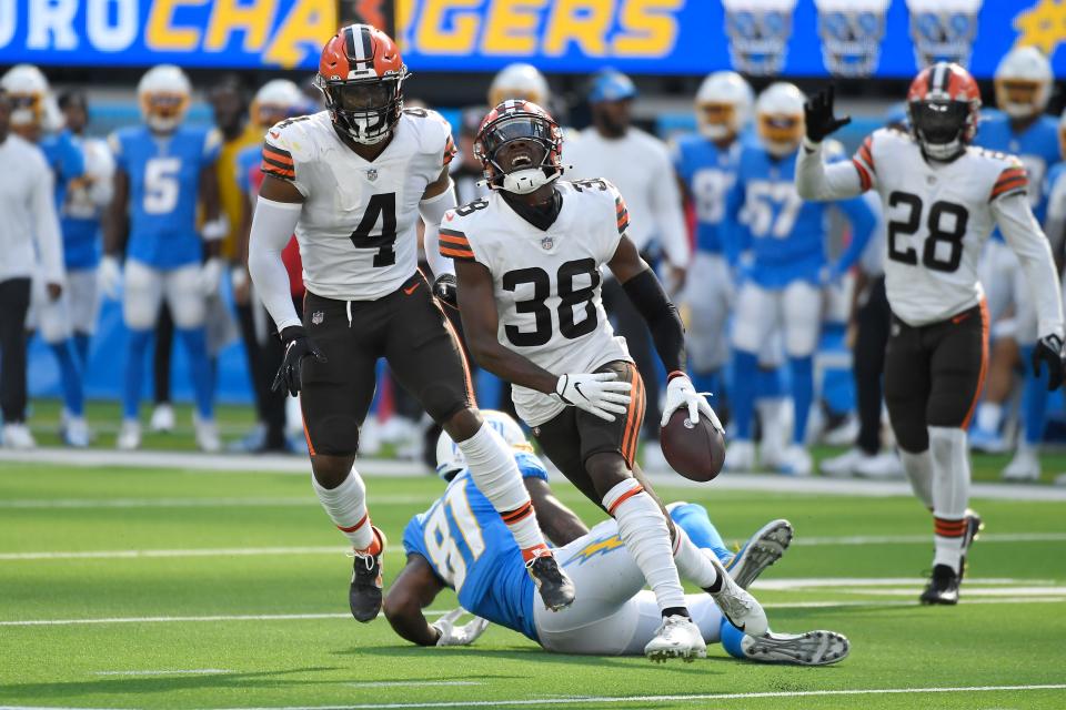 Cleveland Browns cornerback A.J. Green (38) celebrates a defensive play during the second half of an NFL football game against the Los Angeles Chargers Sunday, Oct. 10, 2021, in Inglewood, Calif. (AP Photo/Kevork Djansezian)