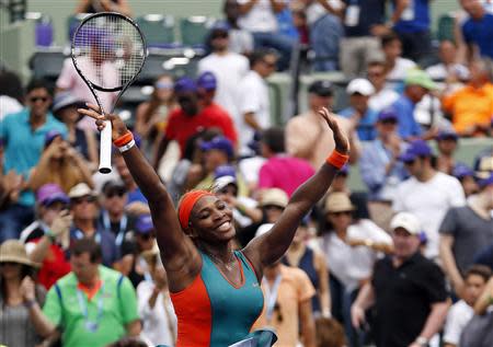 Mar 29, 2014; Miami, FL, USA; Serena Williams celebrates after her match against Li Na (not pictured) during the women's final of the Sony Open at Crandon Tennis Center. Williams won 7-5, 6-1. Mandatory Credit: Geoff Burke-USA TODAY Sports